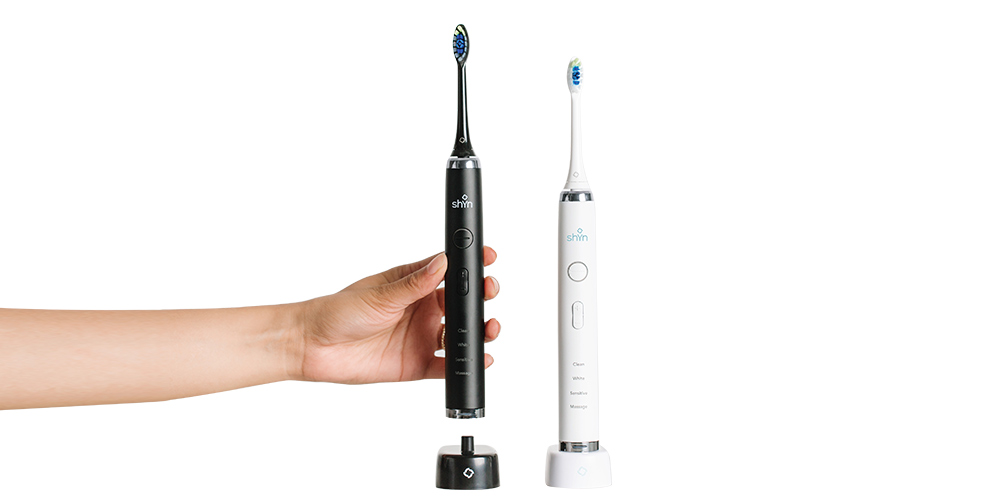 Shyn Sonic Rechargeable Electric Toothbrush with 4 Anti-Plaque Brush Heads, Travel Case & Charger, on sale for $33.99 when you use coupon code MERRY15 during checkout