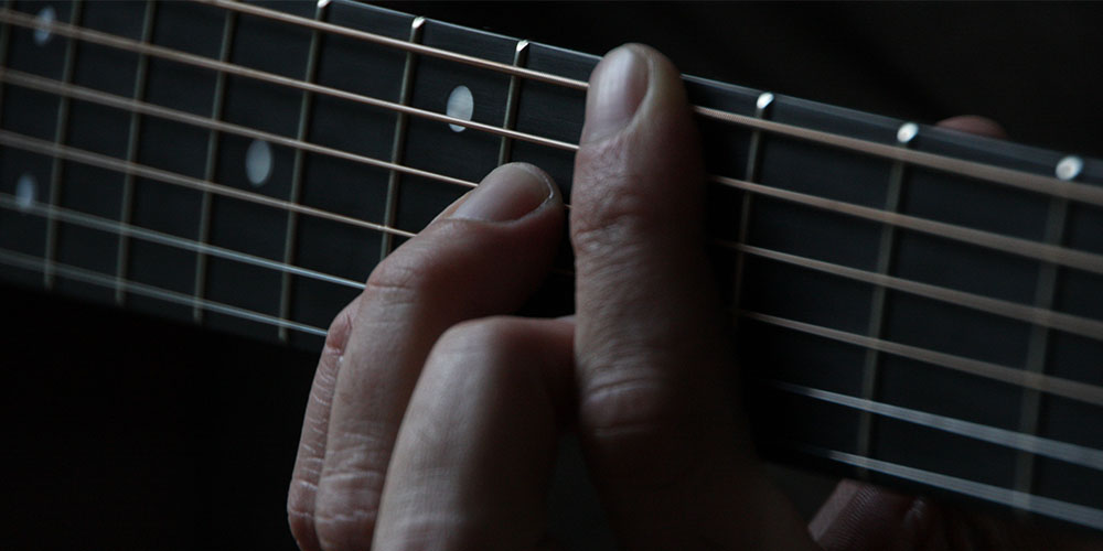 Learn to Play 10 Guitar Songs Using Just 3 Chords