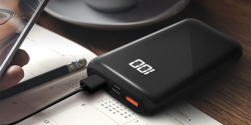 A power bank charging a phone