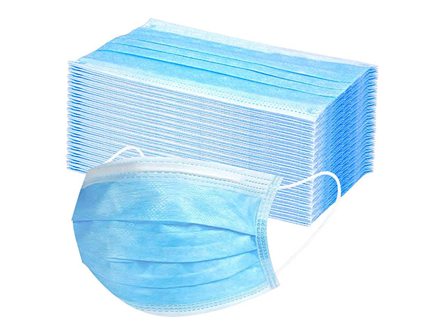 A stack of face masks, with one separated.
